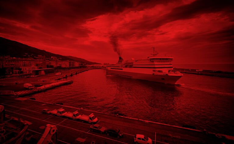 Ship in a harbour with a red background